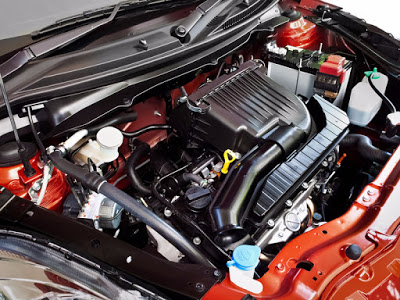 Engine bay during a service in our workshop